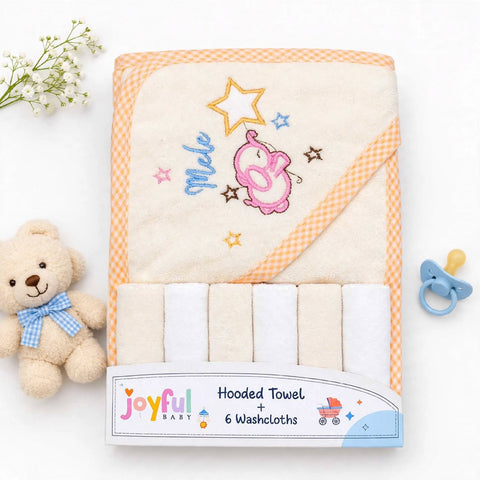 A set of six baby washcloths in a white cardboard package, featuring a hooded towel with orange gingham trim and embroidered details of a pink elephant, a yellow star, and the word 'Moe'. The set is displayed on a white background with a teddy bear, baby 