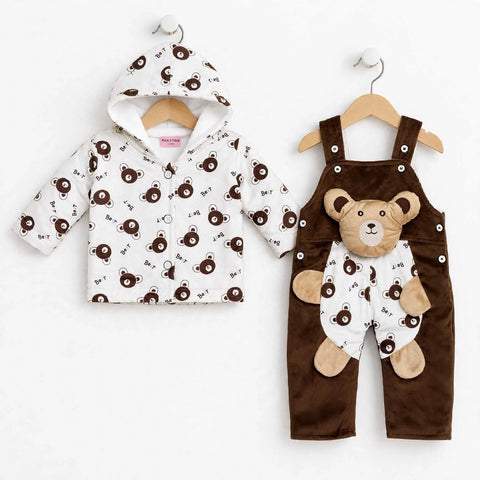 Two-piece baby clothing set displayed on wooden hangers against a white background. The set includes a white hooded long-sleeve top with a brown teddy bear print, and brown corduroy-style overalls with a matching teddy bear applique on the front.