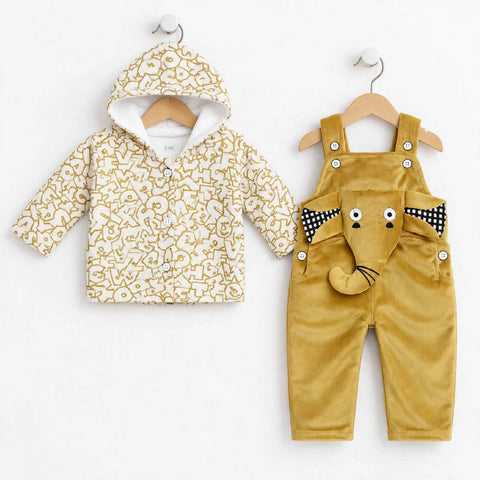 A baby clothing set displayed on wooden hangers against a white background, featuring a cream hooded jacket with mustard yellow abstract patterns and mustard yellow corduroy overalls with a playful elephant face patch and black-and-white polka dot ear acc