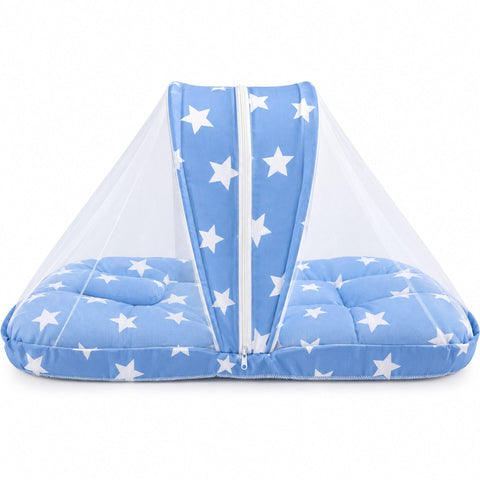 A baby bassinet or pet bed with a light blue fabric base and canopy printed with white stars, enclosed in a clear mesh mosquito net, shown on a white background.