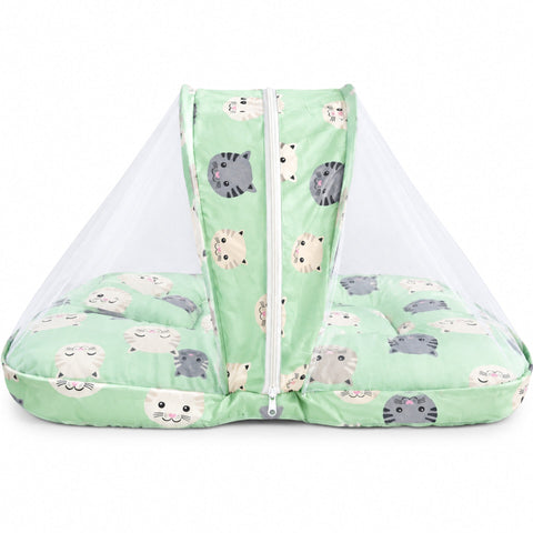 A baby bassinet with a mint green and white cat-patterned fabric base and a clear mesh mosquito net canopy, shown on a white background.