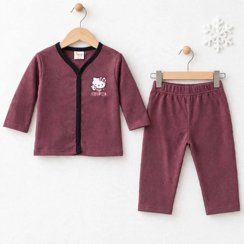 A two-piece baby clothing set consisting of a long-sleeve cardigan and matching pants in a dusty rose/mauve color, displayed on wooden hangers against a white wall. The cardigan features a black trim along the front opening and a Hello Kitty graphic on th