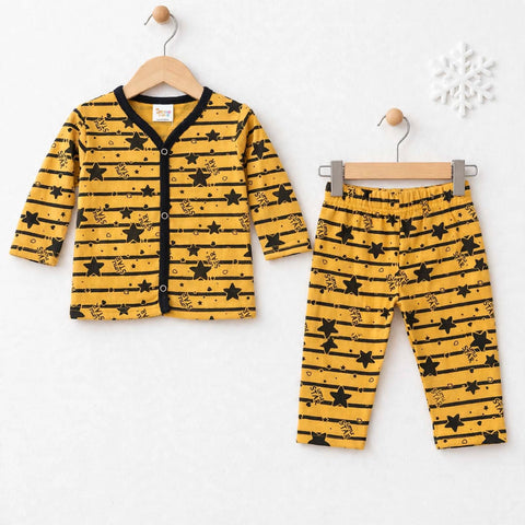 A baby two-piece pajama set consisting of a long-sleeve cardigan and matching pants, displayed on wooden hangers against a white wall. The pajamas feature a mustard yellow background with black horizontal stripes, black stars, and small black bee illustra