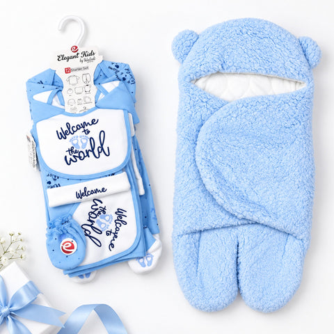A baby gift set featuring a light blue plush bear-shaped swaddle blanket and a matching blue and white printed baby outfit with a 'Welcome to the world' bib, both displayed on a white background.